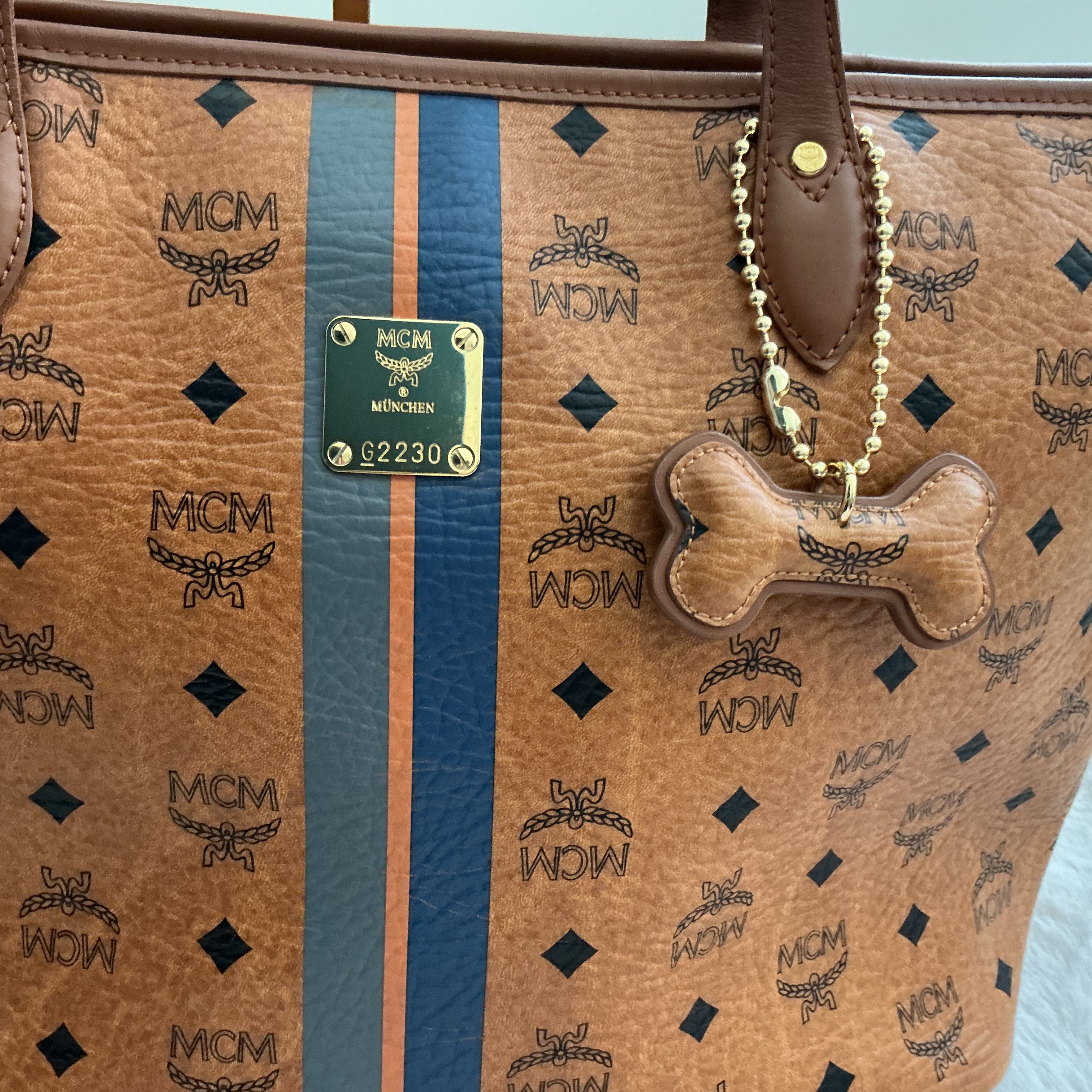 MCM Visetos Cognac Striped Tote Bag with Dog Bone Charm + Matching Zippy Wallet Set