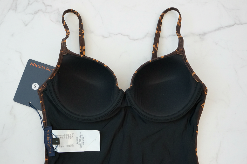 LV Monogram Swimsuit - Label & tag detail on marble
